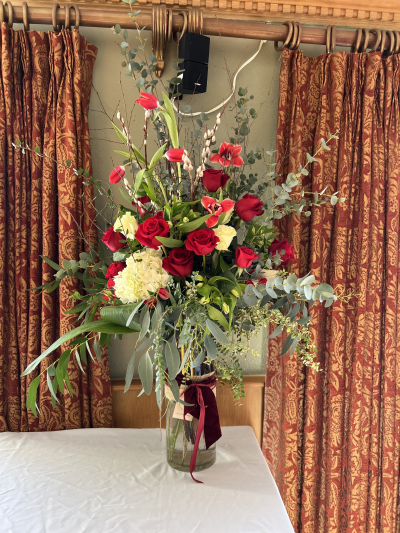 Knock the Sox! - Guaranteed to knock the socks off the recipient this profusion of flowers is a showstopper statement Valentines display. Brace yourself as stands around a metre tall!